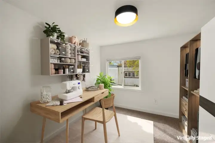 Virtually staged secondary bedroom - hobby space, office, guest room, you decide!