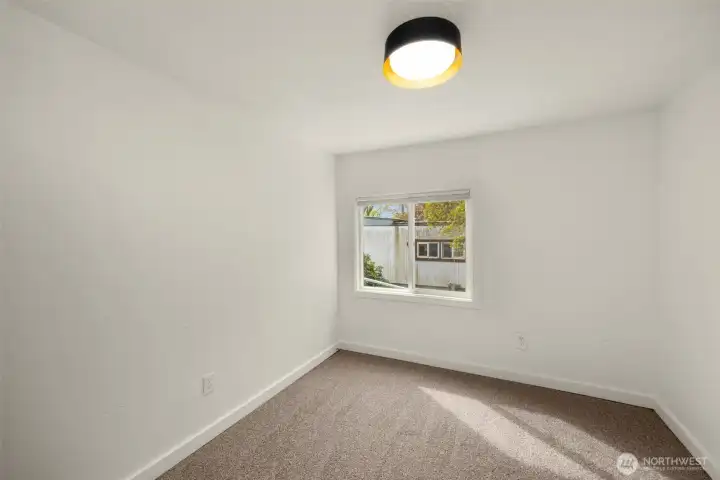 Secondary bedroom without staging.