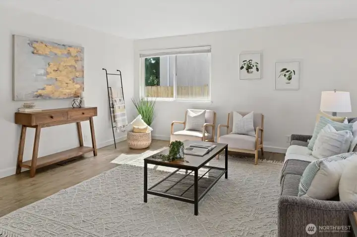 A light and bright living room is right off the entry. A light and bright living room is right off the entry.
