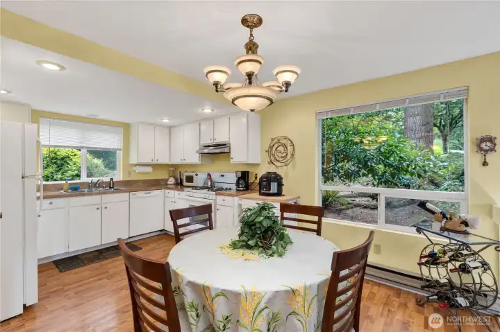 The kitchen offers generous cabinet storage and an easy connection to the dining area for everyday meals and entertaining. The kitchen offers generous cabinet storage and an easy connection to the dining area for everyday meals and entertaining.