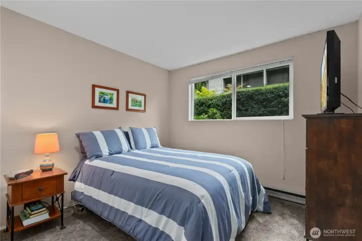 Comfortable secondary bedroom offers ample space, natural light, and flexibility for guests or everyday living. Comfortable secondary bedroom offers ample space, natural light, and flexibility for guests or everyday living.