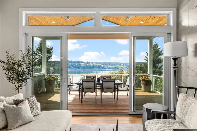 An oversized covered deck unfolds from the great room for an unparalleled experience of the outdoors. Several ceiling heaters will add the warmth needed to ensure you can enjoy the open air setting, even during the rainy season.