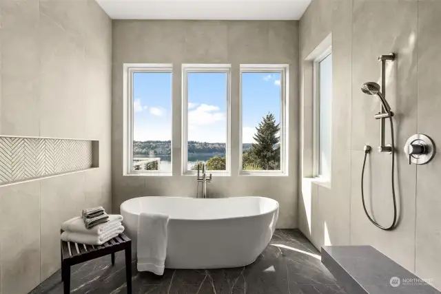 From herringbone tile accenting to the rainshower head, you will love spending time in this beautiful space.