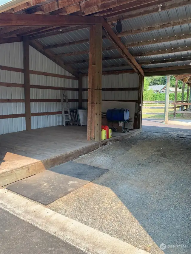 To the right of the horse stalls is the large, drive through equipment and hay barn. This is the raised hay storage platform. Helps to keep it dry. The drive through portion is more than enough space to park a tractor with implements attatched.