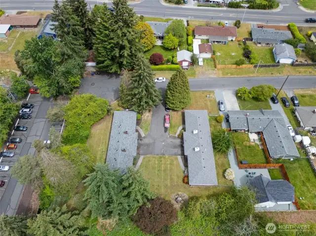 Broader aerial of property and community.