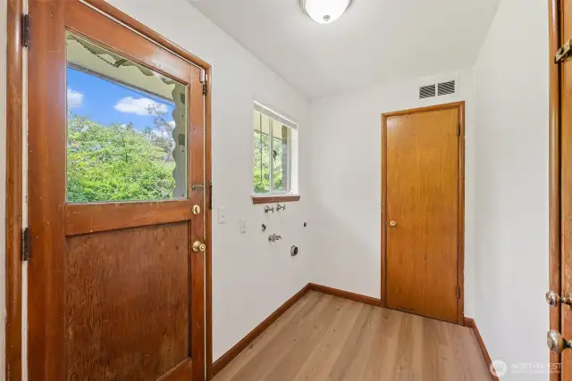 Laundry Room off garage and kitchen areas.