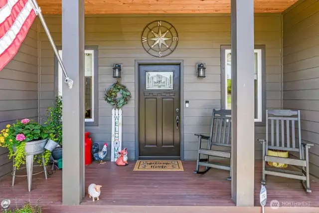Beautiful tongue & groove entry boasts craftsman door with dual keyless locks, great light fixtures and room to relax. Enjoy low maintenance Trex decking on front and back of this lovely home.