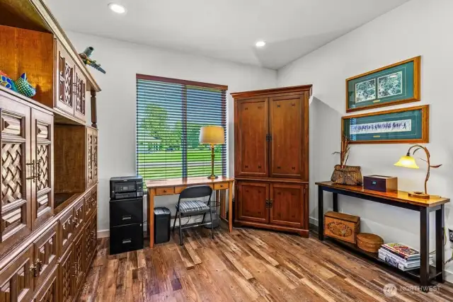 Guest bedroom 2/office sits jsut inside the foyer near main bath & 3rd bedroom.