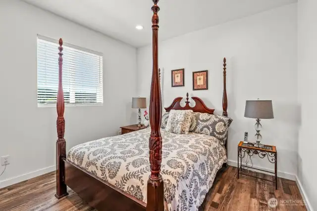 Bedroom 3 perfectly placed alongside the full bath on the guest wing. Engineered hardwood floors throughout this well-appointed home.