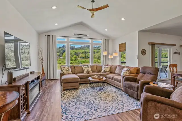 Vaulted great room with elevated & sleek ceiling fan and territorial views to mesmerize!