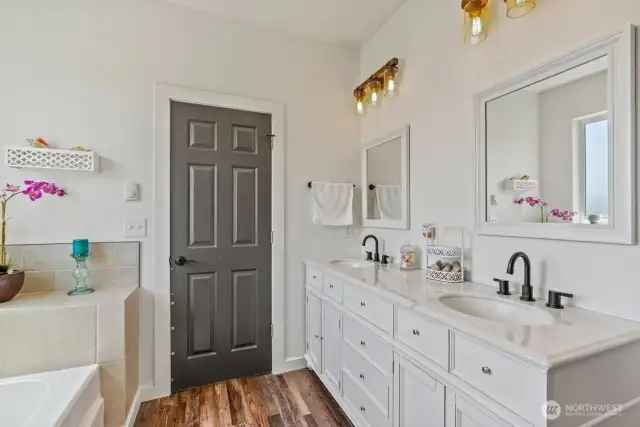 Comfort height dual vanity with quartz countertops, beautiful lighting & fixtures continues...