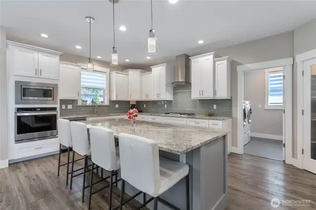 View of kitchen, laundry and large pantry to the right