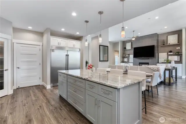 View from kitchen to the livingroom.  The door to the left of the fridge is to the garage