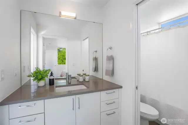 Jack n Jill bathroom on the upper level connects the two bedrooms.