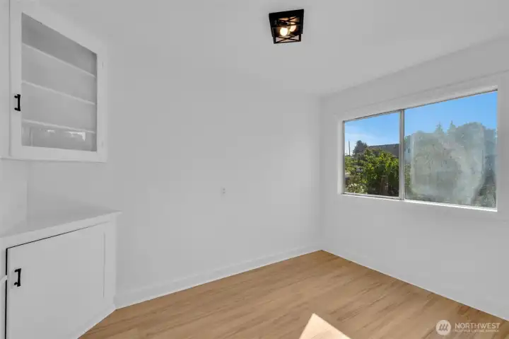 Dinning area with original to house built in.