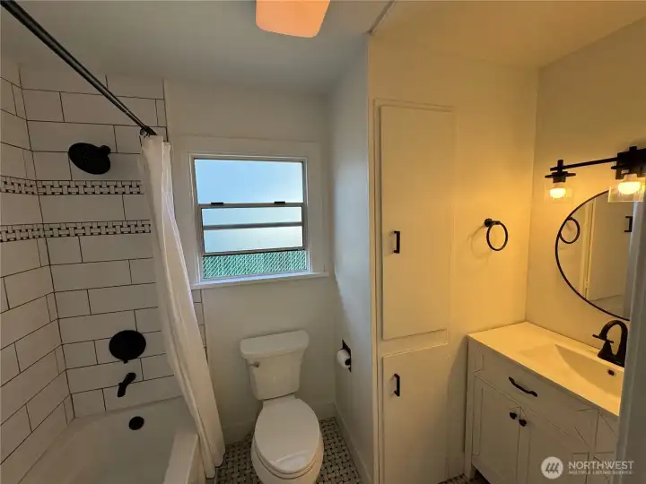 Main floor bath with tiled tub