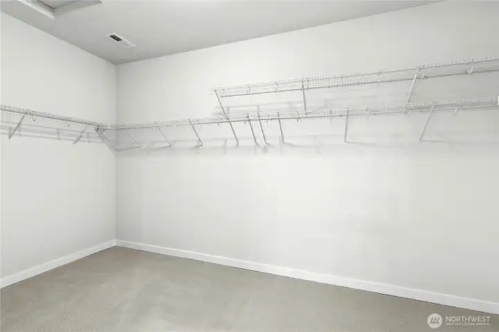 Large walk-in closet for the primary suite.