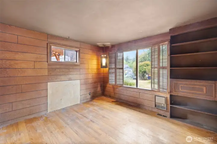 Primary bedroom with hardwood floors