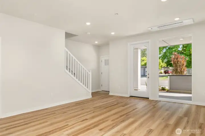 Gathering room, entry, and covered patio