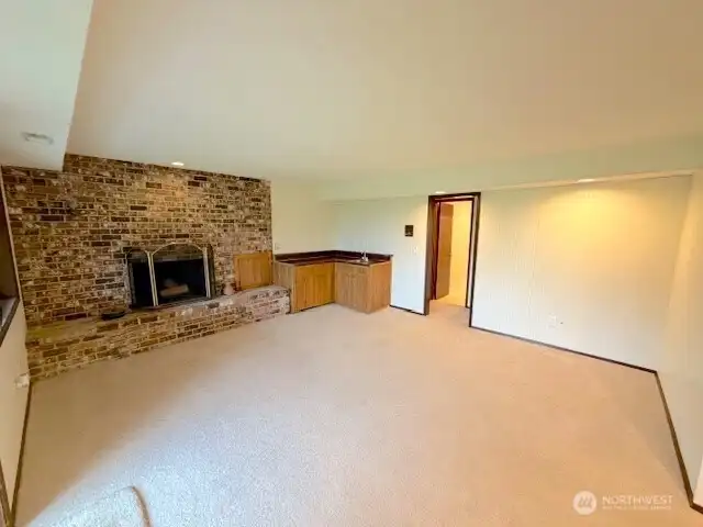 Downstairs in the main house has a fireplace, wet bar and is connected to a separate bedroom and bathroom (multi-generational living IN ADDITION to an ADU for rental income????)