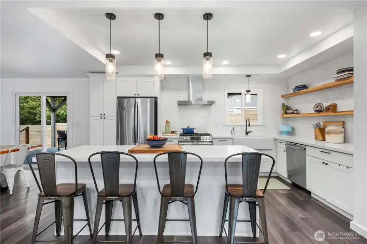 Remodeled kitchen in 2022 with wine fridge and apron sink