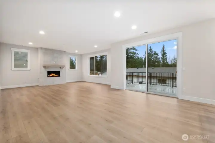 Lots of windows let the light in even on the rainiest days. Nice deck for BBQ and entertaining