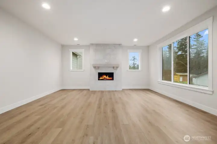 Fully tiled, gas fireplace for cozy gatherings