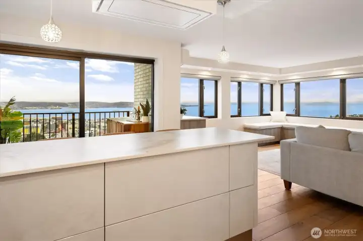 A View that Never Tires: Mountain to Sound by day, gorgeous sunsets and City lights by night.