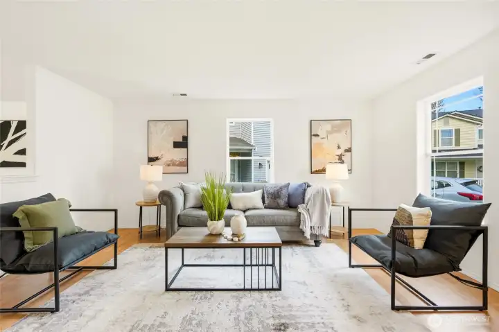 Bright, spacious living room right off the entry