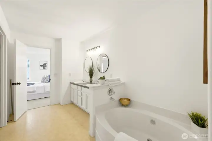 Soaking tub, separate shower, and bright, open feel