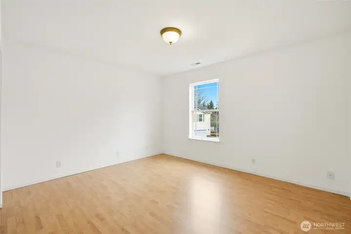 Versatile third bedroom with great natural light, ideal for kids, guests, or remote work.
