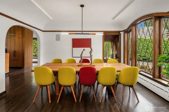 The perfect sized dining room with huge leaded glass windows