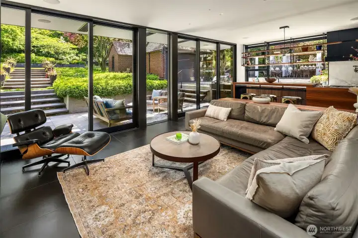 Wall of doors open to the stunning grounds