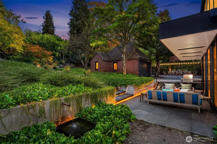 Note the two car garage and the huge Tuscan dining table