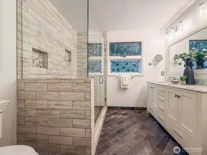 Master Bathroom with double vanity and shower