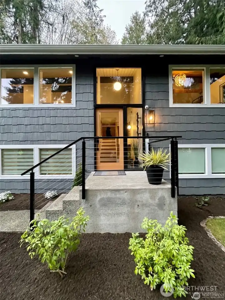 Well lit formal front entry.