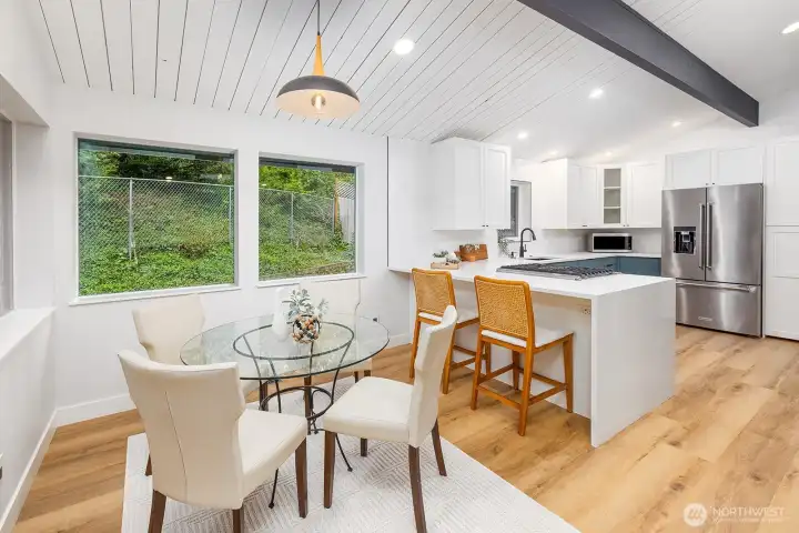 Dining area just off the kitchen looking out over the private yard and covered back patio area.