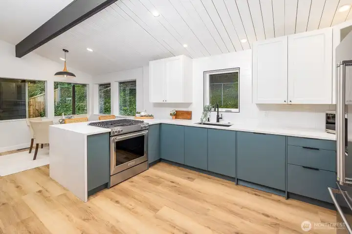 Another view of the kitchen space.  Neutral cabinet colors and loads of storage.
