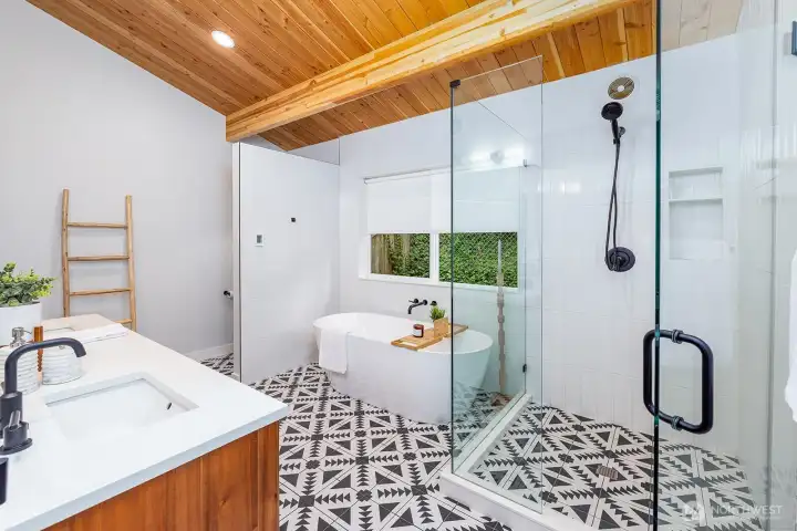 Here it is!  Your dream bathroom!  Walk in shower fully encased in glass, standalone soaking tub,heated floors, dual sinks, and wired for a bidet.