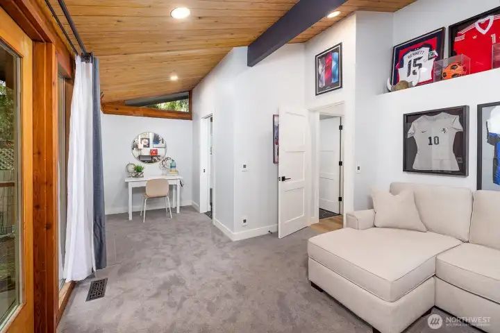 Excellent office, bedroom, guest ensuite, or second primary bedroom.  Cool exposed beams, private deck access back yard, lots of lighting details and access to the full bathroom through a pocket door.