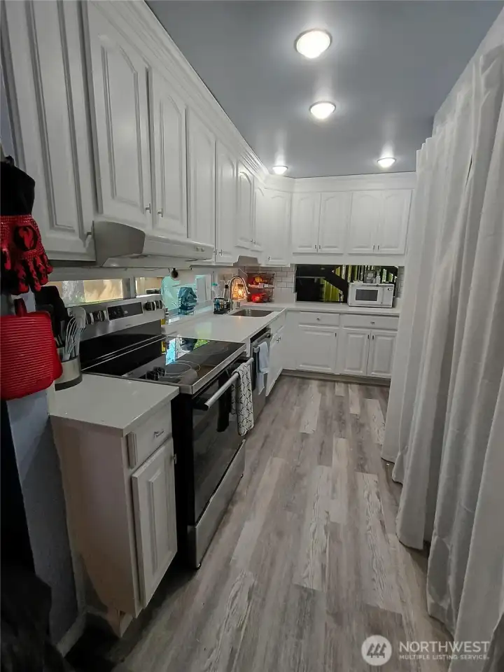 Kitchen, large pantry to right.