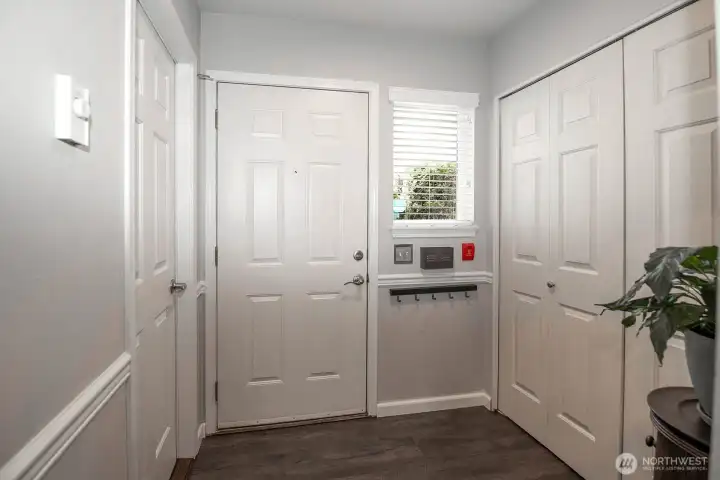 Entry from front door and garage door on left.  Entry closet on right