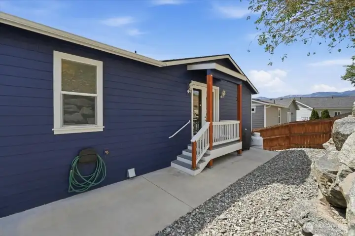 Back yard leading into kitchen area.