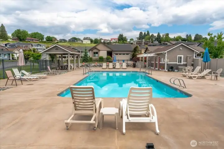 Perfect way to spend a day in the sun relaxing in the community pool right down the street!