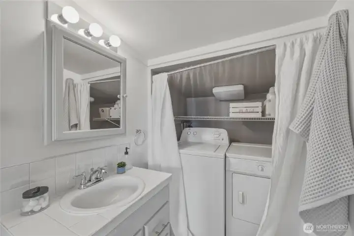 Bathroom has full shower and tub.