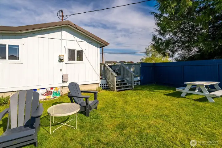 A fenced back yard that provides so much space to enjoy the Birch Bay sun.