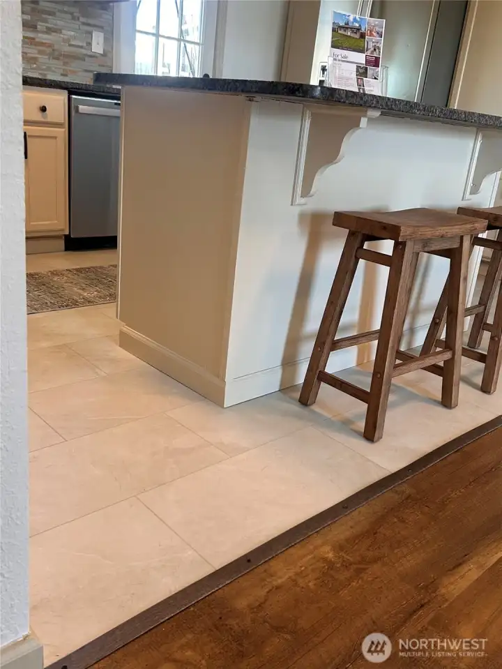 Kitchen floor was replaced with LVP tiles May 2025 Kitchen floor was replaced with LVP tiles May 2025