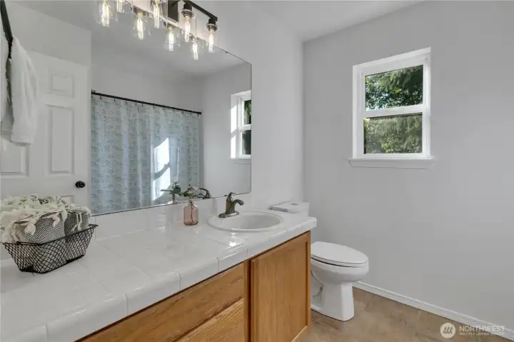 Main, full bathroom upstairs Main, full bathroom upstairs
