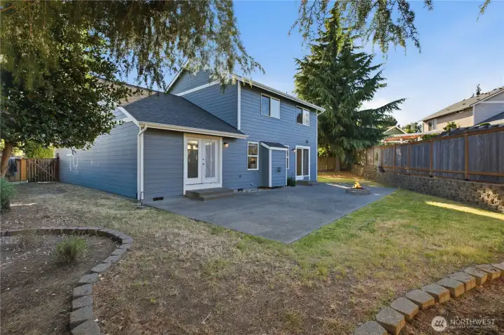 Spacious backyard wraps around either side of the house. Spacious backyard wraps around either side of the house.