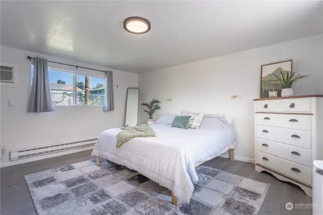 Oversized primary bedroom with lots of natural lighting.(Primary Bedroom)